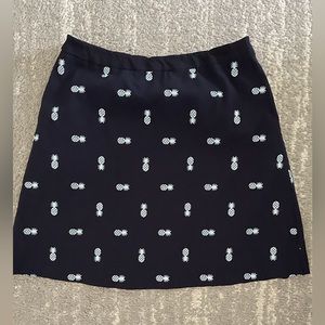 Navy blue with embroidered pineapples